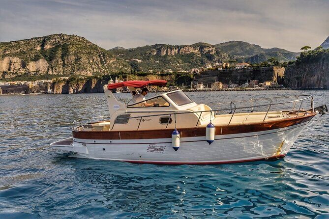Private Tour to Capri & Positano from Sorrento Classic Gozzo 850 - Positano in 1 hour: colorful cliffs, narrow lanes, and sandals