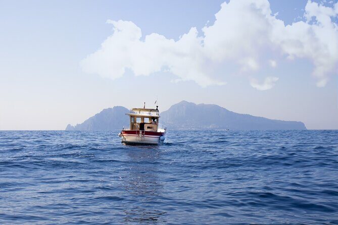 Private tour with fishing, tour of Capri and lunch on board - Punta Carena Lighthouse lunch on board, plus snorkeling in clear water