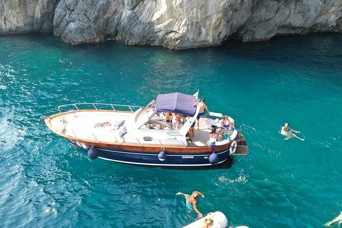 Small Group Boat Tour: Discover the Amalfi Coast from Positano - Fiordo di Furore: The Fjord, the Bridge, and the Photo Stop