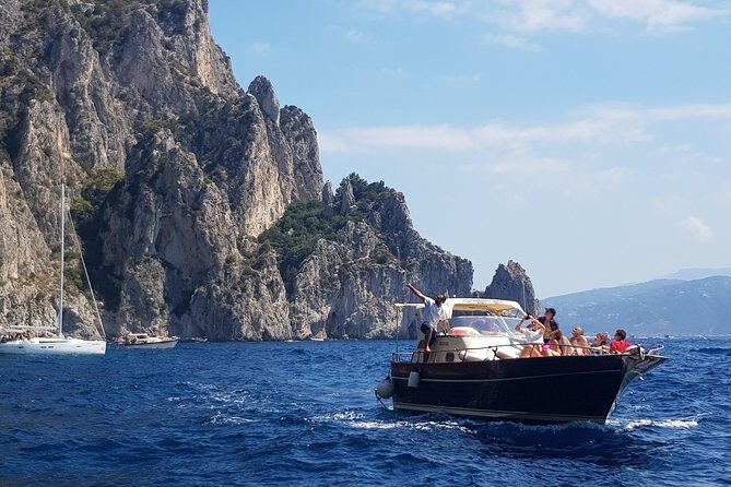 Small-Group Capri and Blue Grotto Boat Tour from Sorrento 5 Hours - Faraglioni photos and Marina Piccola’s swim break