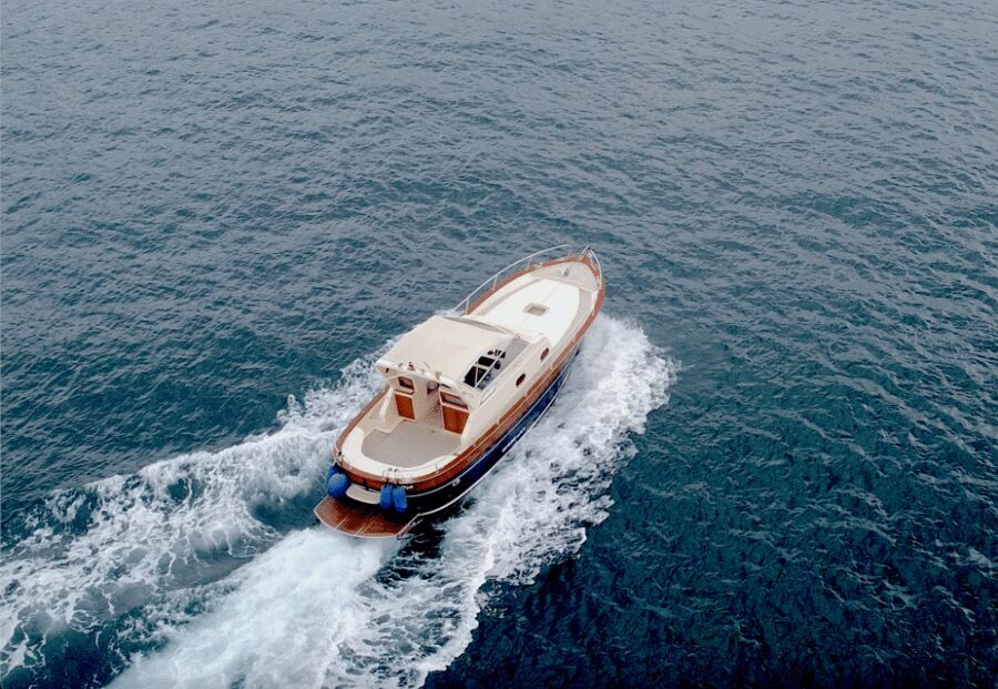 Sorrento: Luxury Private boat to Capri & visit Blue Grotto - Stop 1 near Sorrento: Queen Giovanna’s Baths and the coast history