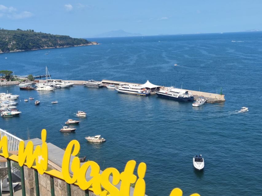 Sorrento: walking in the Grand Tour with stunning landscapes - Marina Grande: fishermen, gates, and a Vesuvius-facing view