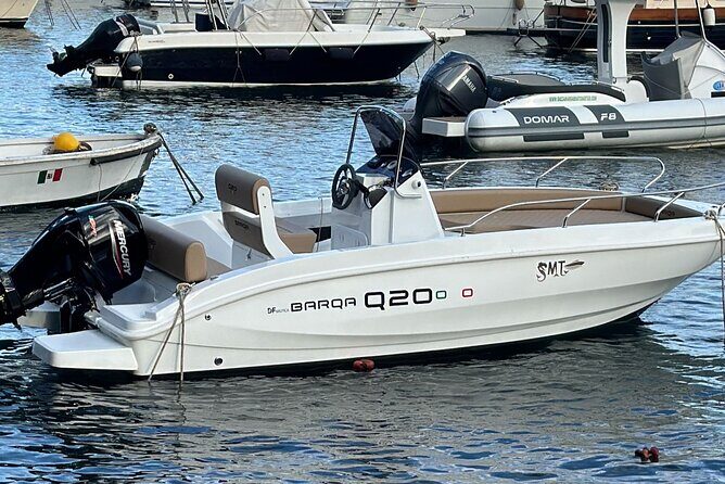 Sorrentomaxiboat tours to Capri - On-board drinks, comfort touches, and photo-help that actually matters