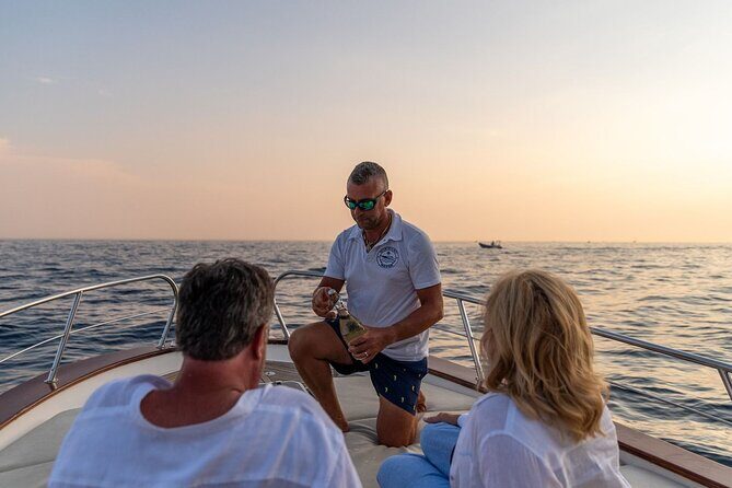 Sunset tour by private boat from Positano, Praiano or Amalfi - Onboard aperitif: drinks, snacks, towels, WC, and snorkeling time